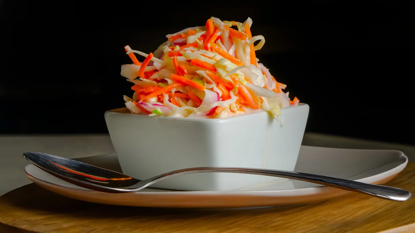 Fresh slaw in a white bowl