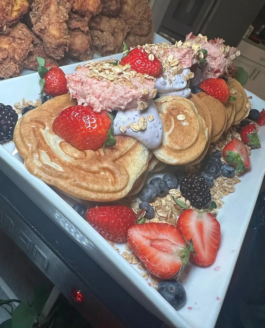 Pancakes with strawberries and blackberries