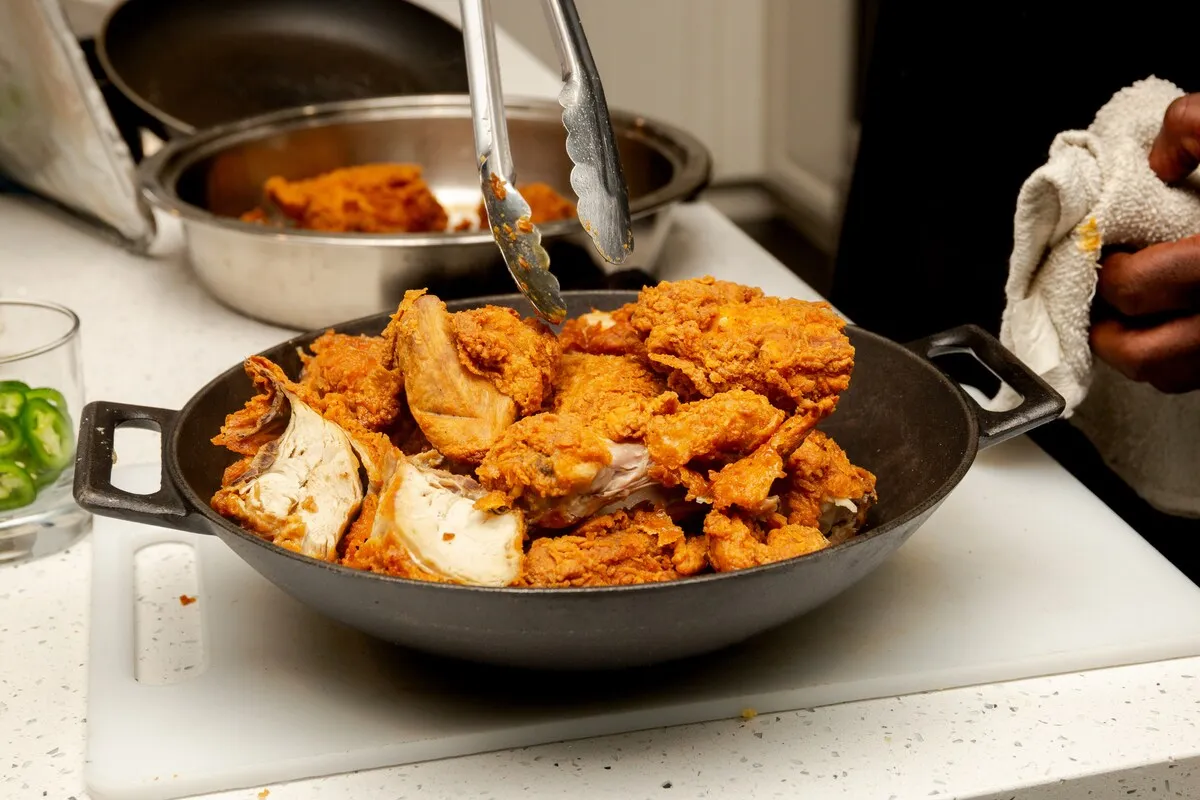 A pan of golden fried chicken