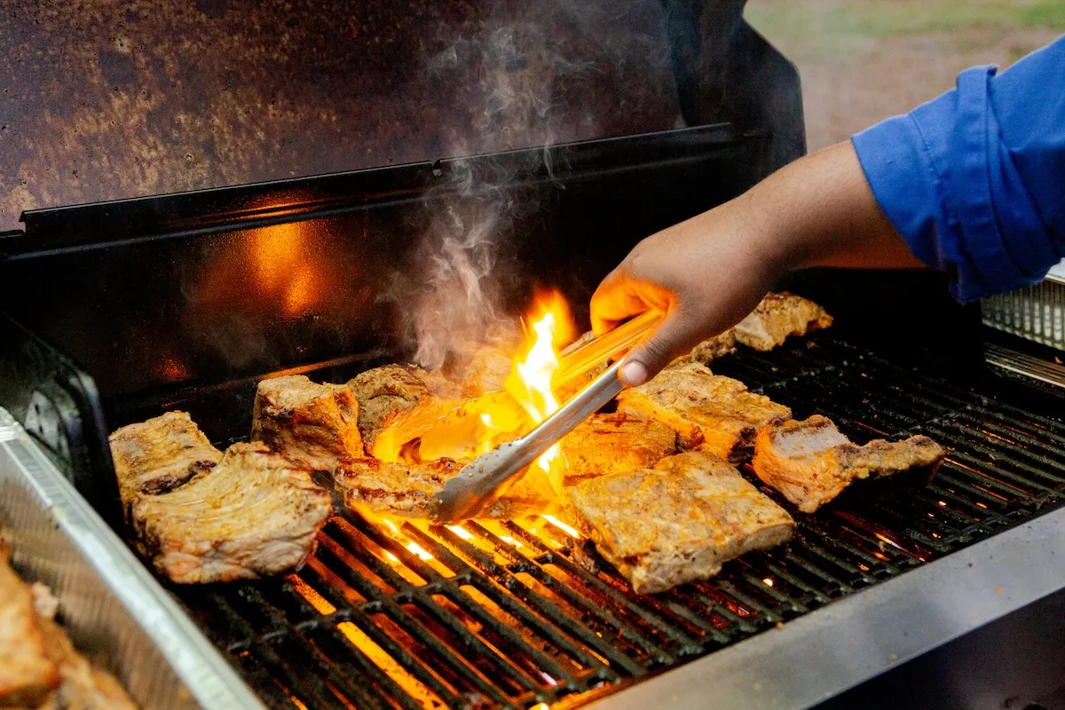Tony grilling outdoors